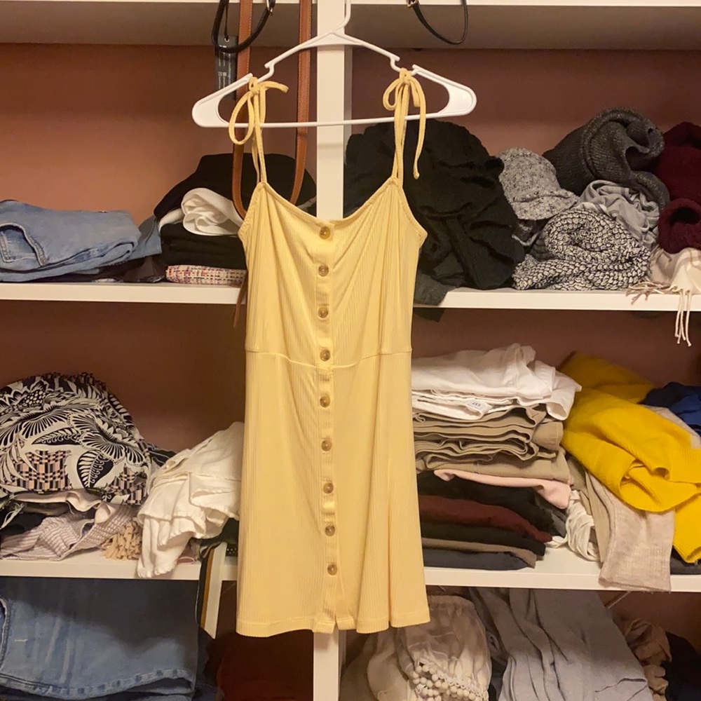 Never worn pale yellow tie shoulder mini dress